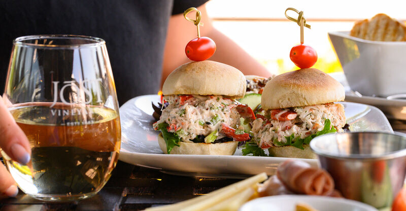 Lobster sliders and white wine served at Seagrape Café